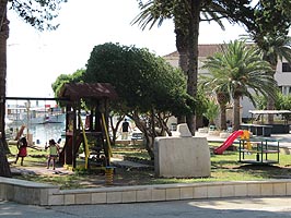 Children's playground in the park in the center of Sucuraj